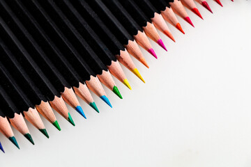 Wall Mural - Collection of multicolored pencils on a white background.