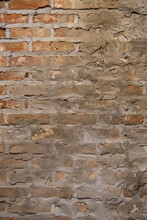 Vertical Shot Of An Old Red Brick Wall