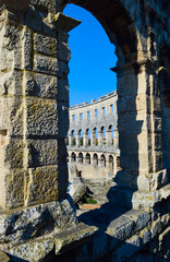 Wall Mural - Details of the ancient Roman amphitheater arena in Pula, one of the best preserved landmark of Croatia. Tourist attraction and UNESCO heritage.