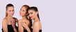 © Viorel - Banner,long format. Cute girlfriends in black tops are smiling and posing against a white studio background.