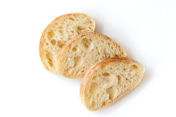 Slice of ciabatta bread isolated on white background, top view.