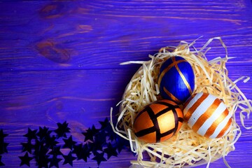 Poster - Easter eggs on a wooden background