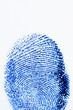 © Tetra Images/Tetra Images - Close up of fingerprint on white background