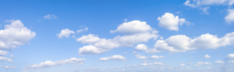 Panorama or panoramic photo of blue sky and white clouds or cloudscape.