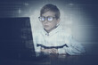 portrait of a boy at a computer