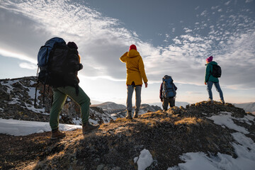 Wall Mural - Hikers or tourists are relaxing on mountain top