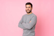 © luismolinero - Caucasian handsome man over isolated background with arms crossed and looking forward