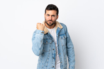 Young handsome man with beard isolated on white background with unhappy expression