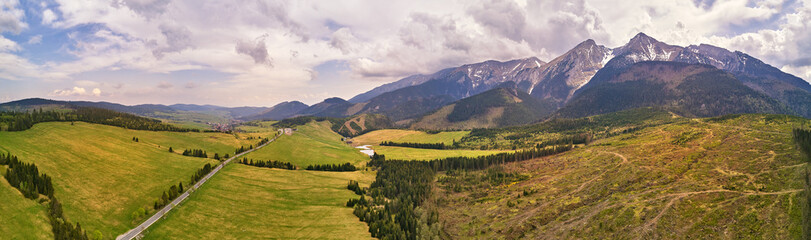 Wall Mural - Road from Poland to Slovakia. Spring rainy weather mountain panorama.