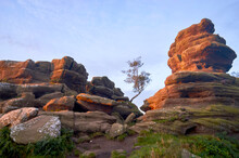 Low Angle View Of Rock Formations Against Sky