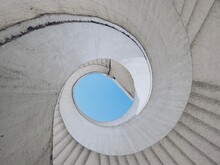 Brutalist Spiral Staircase With A View Of The Sky Located In Warsaw, Poland