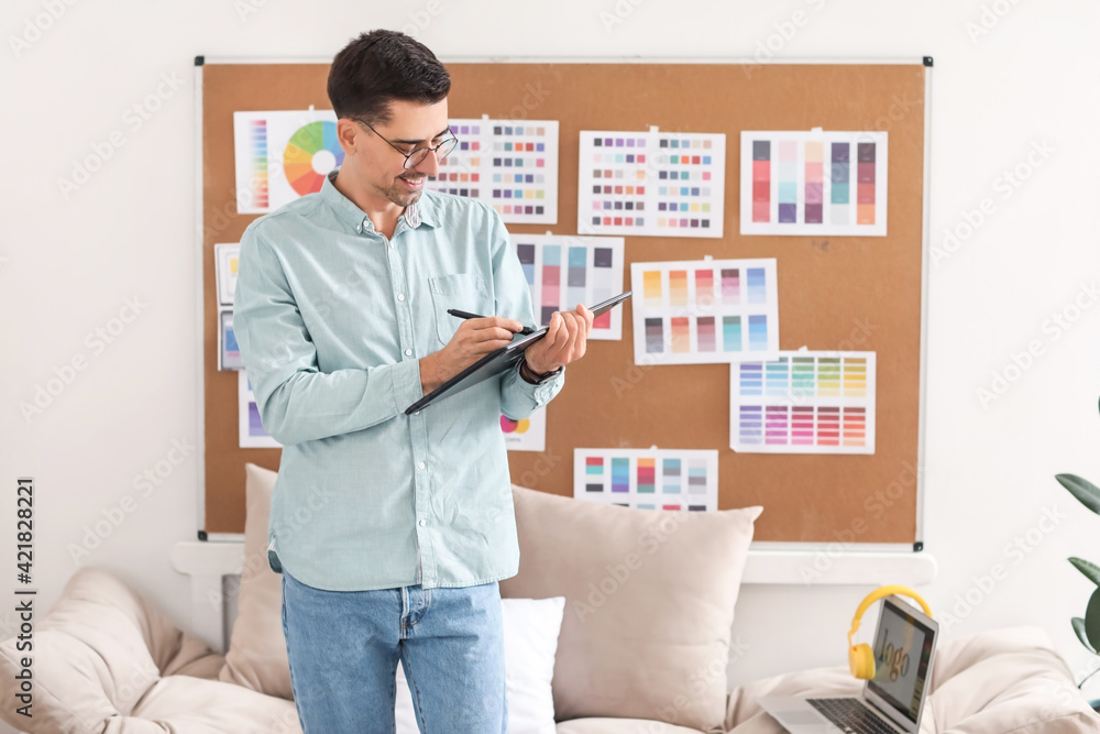 Graphic designer working in office