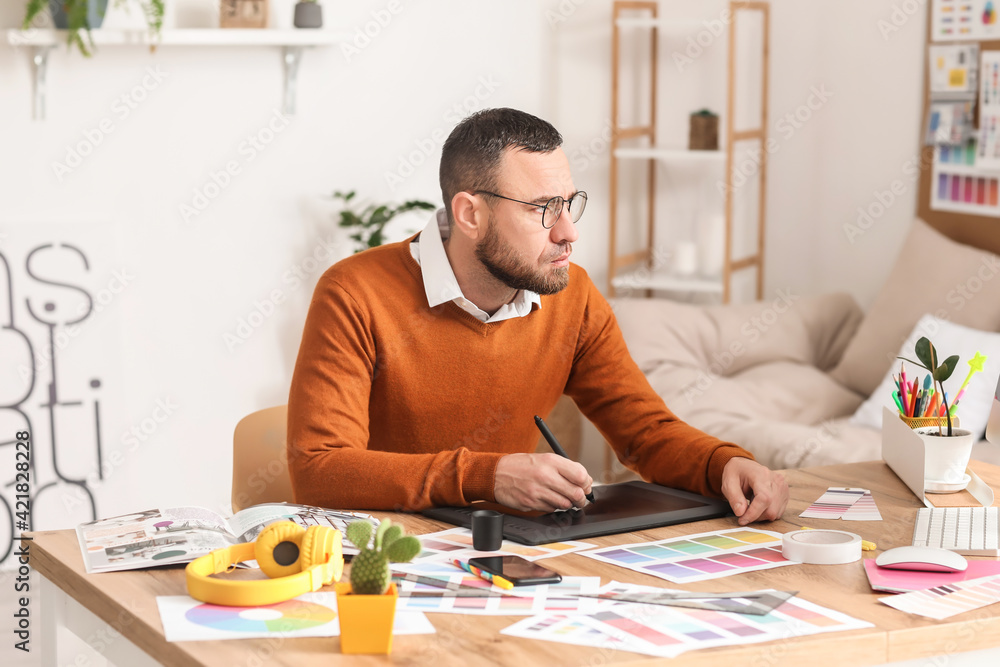 Male designer working in office