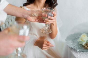 Wall Mural - a man offers a woman a glass of wine