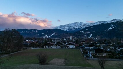 Wall Mural - timelapse of sunset over garmisch-partenkirchen in winter
