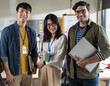 © saksit - Portrait of Asian creative business team. Hipster Creative Startup Young business people in modern office.