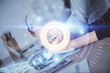 © peshkova - Double exposure of woman hands typing on computer and crypto market theme hologram drawing. Blockchain concept.