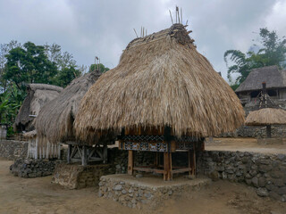 Wall Mural - Traditional bhaga huts or female ancestor symbol of the Ngada people or tribe in Luba village near Bajawa on Flores island, East Nusa Tenggara, Indonesia