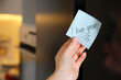 © New Africa - Woman with sticky note saying I Love You near fridge door, closeup. Romantic message