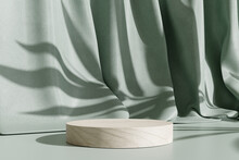 Wooden Product Display Podium Stand With Shadow Nature Leaves On Green Curtain Background. 3D Rendering