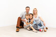 © Angelov - Smiling young parents and their children are very happy, they are at home