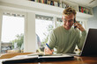 © Jacob Lund - Man staying at home and working