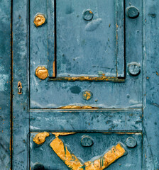 Wall Mural - Fragment of old door with cracked paint