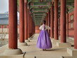 Wearing Hanbok (traditional Korean clothes) in Gyeongbokgung Palace in Seoul, Korea