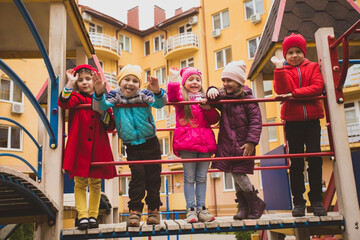 Poster - Group of kids walking on the playground