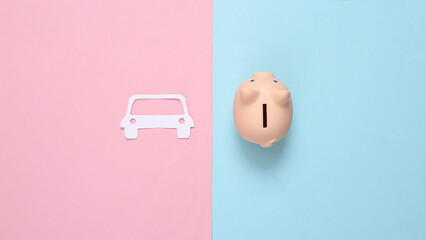 Wall Mural - Paper cut car and piggy bank on blue pink background