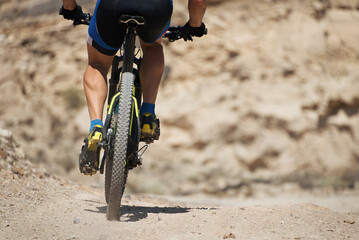 Poster - Mountain bike sport athlete man on a mountain bike trails on rocky terrain