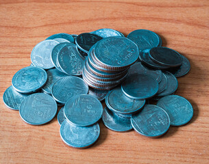 this is a picture of a financial show	coins on the table coins on blue background