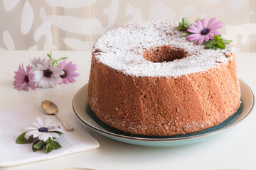 chiffon cake with chocolate and flowers 