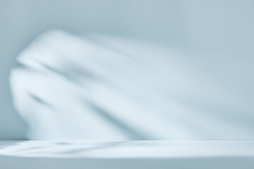 Abstract blue background with drop shadow and light. Backdrop for product presentation