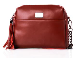 Bag for women, model made of marsala leather. Decorated with a leather tassel. Long handle chain