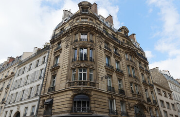 Poster - Traditional French house with typical balconies and windows. Paris .