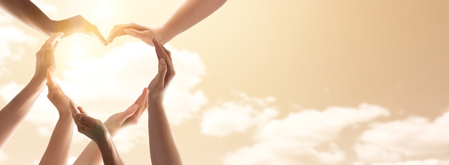 Fototapete - The concept of unity, cooperation, teamwork and charity.
