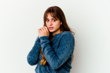 Wall Mural - Young caucasian cute woman isolated on white background scared and afraid.