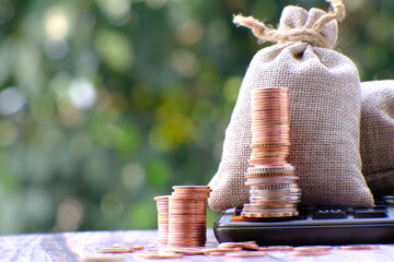 Poster - coins on table background and saving money and business growth concept,finance and investment concept