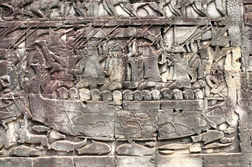 Wall Mural - Bas-relief on wall of Prasat Bayon temple, Angkor Wat, Siem reap, Cambodia