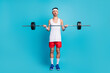 Photo of young sportsman lift heavy barbell grimacing exercise bodycare isolated over blue color background