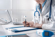 © StockPhotoPro - Doctor writing a medical prescription