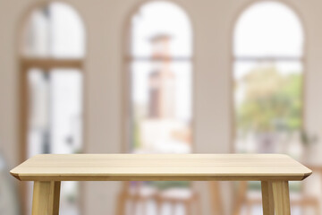 Wall Mural - Empty wood table top with cafe restaurant interior blur background