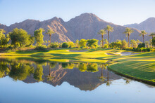 Beautiful Golden Light Over Indian Wells Golf Resort, A Desert Golf Course In Palm Springs, California, USA With View Of The San Bernardino Mountains.