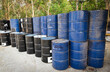 old oil barrels or chemical drums stacked up, industry oil barrel