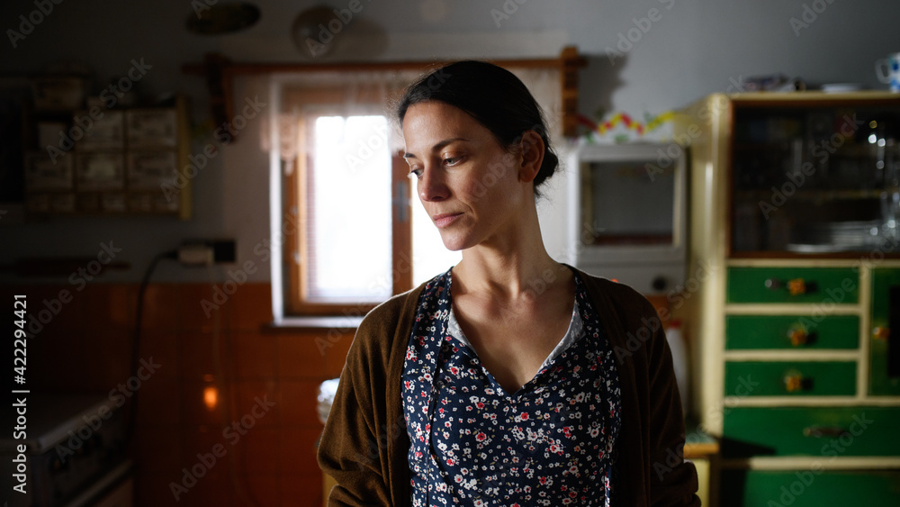 Portrait of poor mature woman indoors at home, poverty concept. - obrazy, fototapety, plakaty 