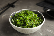 Japanese Seaweed Salad Served On Grey Table, Closeup