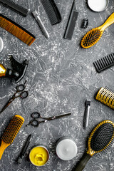 Wall Mural - Tools for hairdress in barbershop on gray background top view mock-up