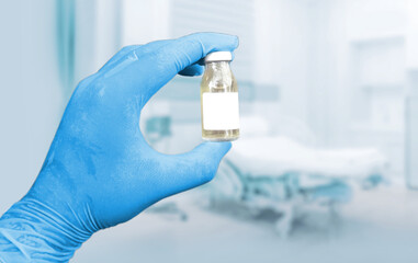 hygine hand with doctor glove show clear vaccine or serum on blank background