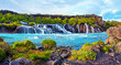 Magical nice captivating landscape with Hraunfossar and Barnafoss waterfalls near Reykholt, Iceland. Exotic countries. Amazing places. (Meditation, antistress - concept).